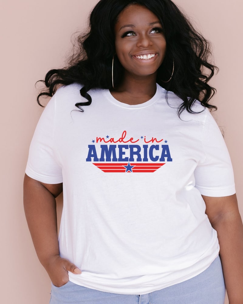 Front of a model wearing a size Large Made In America Stripes in White by Simply Sage Market. | dia_product_style_image_id:281532